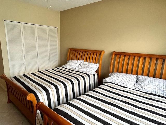 880 Mandalay Ave Unit C1103, Clearwater Beach, FL 33767 - tiled bedroom featuring a closet
