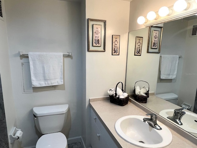880 Mandalay Ave Unit C1103, Clearwater Beach, FL 33767 - bathroom with toilet and vanity