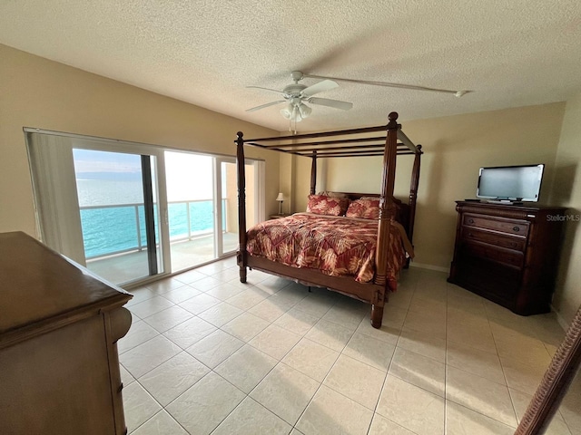 880 Mandalay Ave Unit C1103, Clearwater Beach, FL 33767 - bedroom featuring access to outside, a textured ceiling, light tile patterned floors, and a ceiling fan