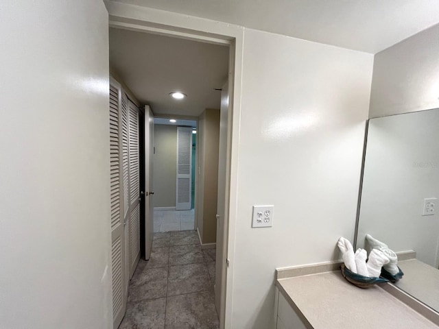 880 Mandalay Ave Unit C1103, Clearwater Beach, FL 33767 - corridor with tile patterned flooring