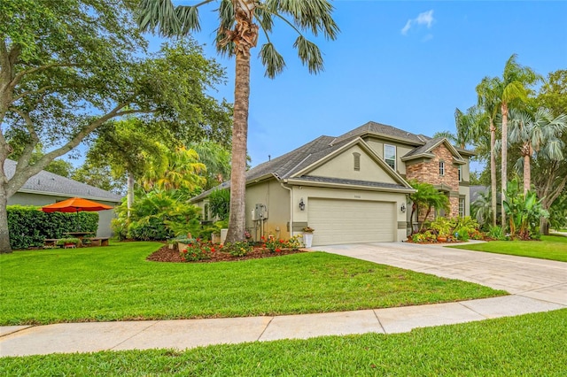3000 Naughton Way, Tarpon Springs, FL 34688 - view of front of house with stucco siding, driveway, a front yard, and a garage