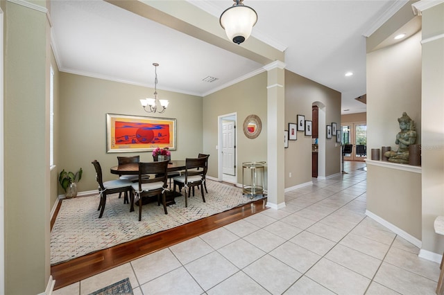 3000 Naughton Way, Tarpon Springs, FL 34688 - dining room with light tile patterned floors, crown molding, ornate columns, baseboards, and recessed lighting