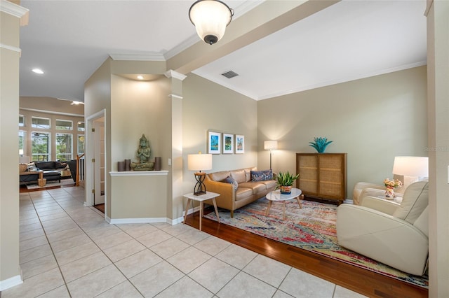 3000 Naughton Way, Tarpon Springs, FL 34688 - tiled living room with ornamental molding, baseboards, and recessed lighting