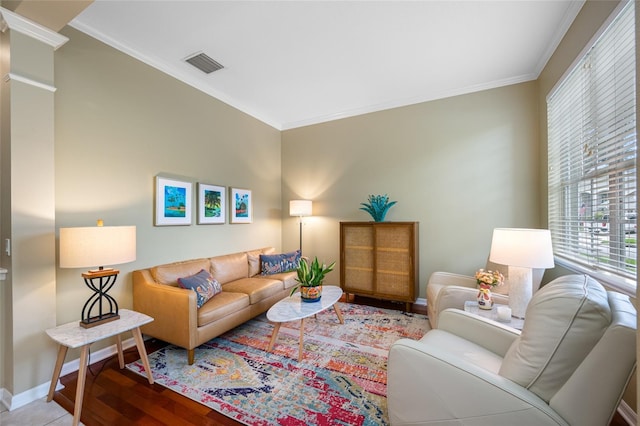 3000 Naughton Way, Tarpon Springs, FL 34688 - living room featuring baseboards, ornamental molding, and wood finished floors