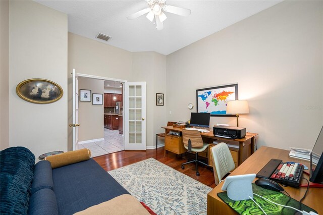 3000 Naughton Way, Tarpon Springs, FL 34688 - office space featuring french doors, a ceiling fan, wood finished floors, and baseboards