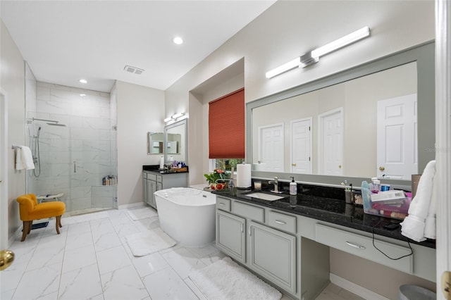 3000 Naughton Way, Tarpon Springs, FL 34688 - full bathroom with marble look tiles, a stall shower, vanity, a soaking tub, and recessed lighting