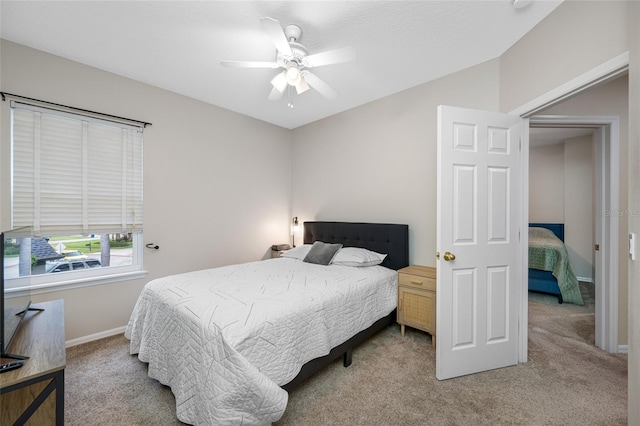 3000 Naughton Way, Tarpon Springs, FL 34688 - bedroom featuring light colored carpet, baseboards, and ceiling fan
