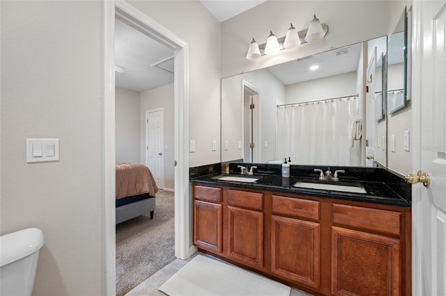 3000 Naughton Way, Tarpon Springs, FL 34688 - ensuite bathroom featuring double vanity and toilet
