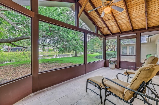 13898 Egret Ln, Clearwater, FL 33762 - sunroom / solarium featuring a water view, a ceiling fan, french doors, and healthy amount of natural light
