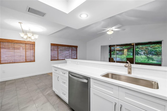 13898 Egret Ln, Clearwater, FL 33762 - kitchen featuring dishwasher, a sink, light countertops, lofted ceiling, and a chandelier