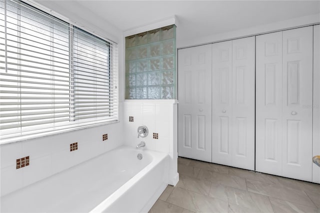 13898 Egret Ln, Clearwater, FL 33762 - bathroom featuring a closet and a bath