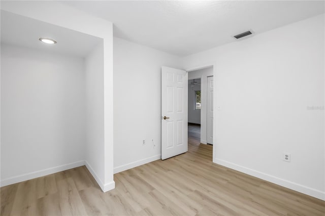 13898 Egret Ln, Clearwater, FL 33762 - unfurnished room with light wood-type flooring and baseboards