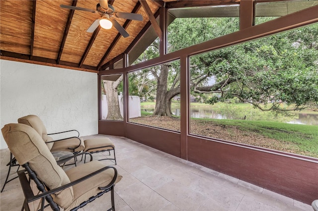 13898 Egret Ln, Clearwater, FL 33762 - sunroom with a ceiling fan and a water view