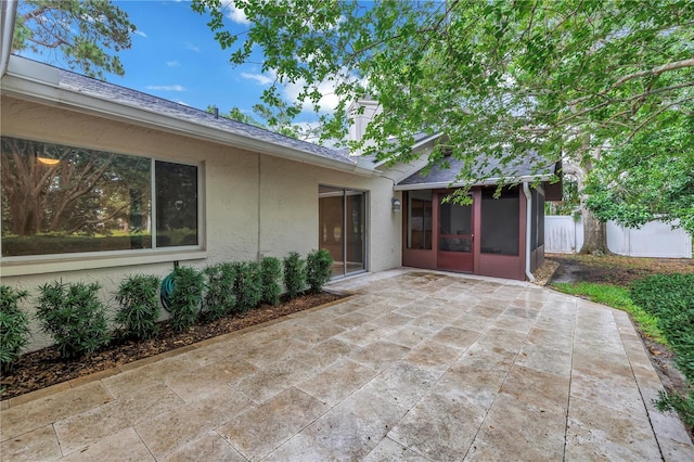 13898 Egret Ln, Clearwater, FL 33762 - view of patio featuring a sunroom