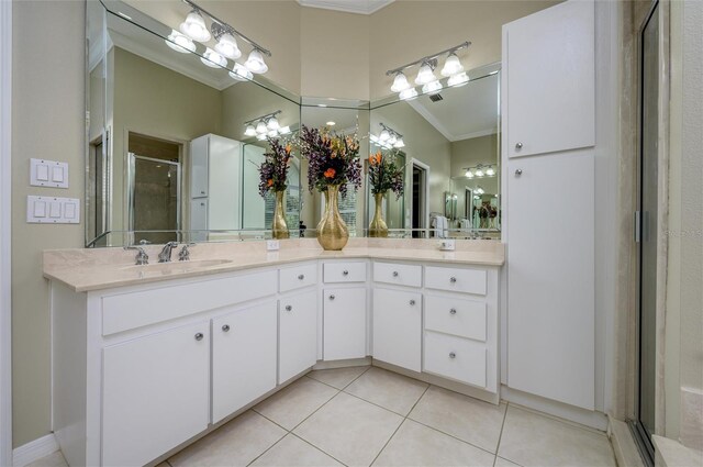 8444 Shenandoah Run, Wesley Chapel, FL 33544 - full bath featuring double vanity, a shower stall, tile patterned floors, and ornamental molding