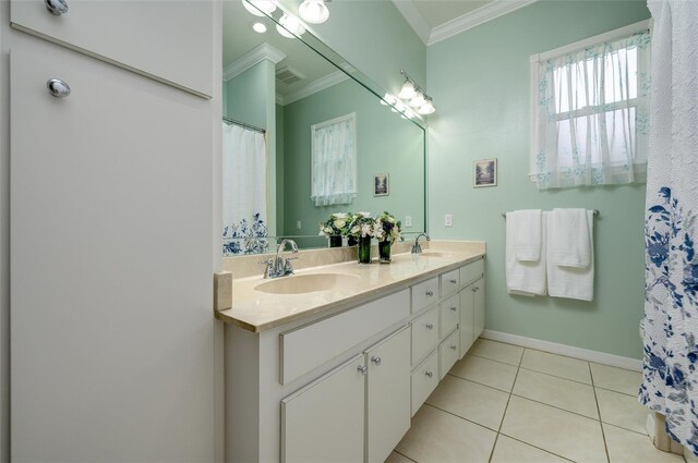 8444 Shenandoah Run, Wesley Chapel, FL 33544 - full bath featuring ornamental molding, double vanity, tile patterned flooring, and baseboards