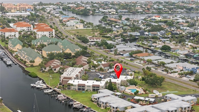 1028 Apollo Beach Blvd Unit 203, Apollo Beach, FL 33572 - aerial view of property's location featuring a nearby body of water and nearby suburban area