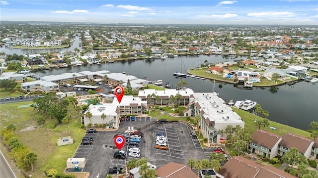 1028 Apollo Beach Blvd Unit 203, Apollo Beach, FL 33572 - aerial view of property's location with a large body of water and nearby suburban area