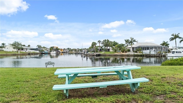 1028 Apollo Beach Blvd Unit 203, Apollo Beach, FL 33572 - surrounding community featuring a water view, a lawn, and a residential view