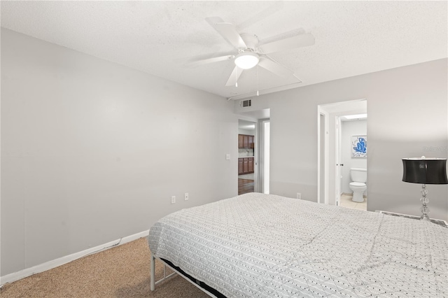 1028 Apollo Beach Blvd Unit 203, Apollo Beach, FL 33572 - bedroom with carpet, ceiling fan, and ensuite bath