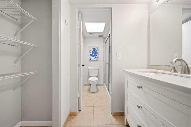 1028 Apollo Beach Blvd Unit 203, Apollo Beach, FL 33572 - full bath with vanity, a shower stall, and tile patterned flooring