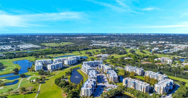 960 Starkey Rd Unit 9104, Largo, FL 33771 - aerial view of apartment complex, a large body of water, a golf club, and a tree filled landscape