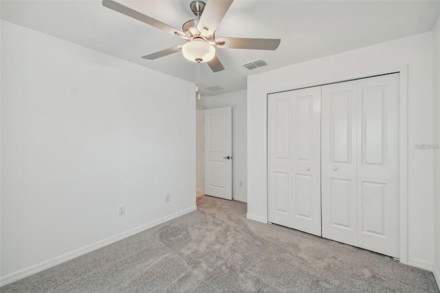 9828 Branching Ship Trce, Wesley Chapel, FL 33545 - unfurnished bedroom featuring carpet, baseboards, a closet, and ceiling fan