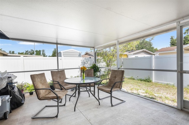 10213 Westport Ct, Tampa, FL 33615 - sunroom / solarium with outdoor dining area