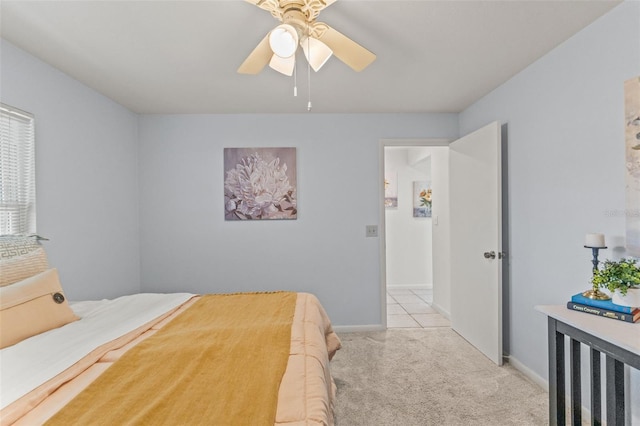 3956 N Tamarisk Pt, Beverly Hills, FL 34465 - carpeted bedroom with baseboards and a ceiling fan