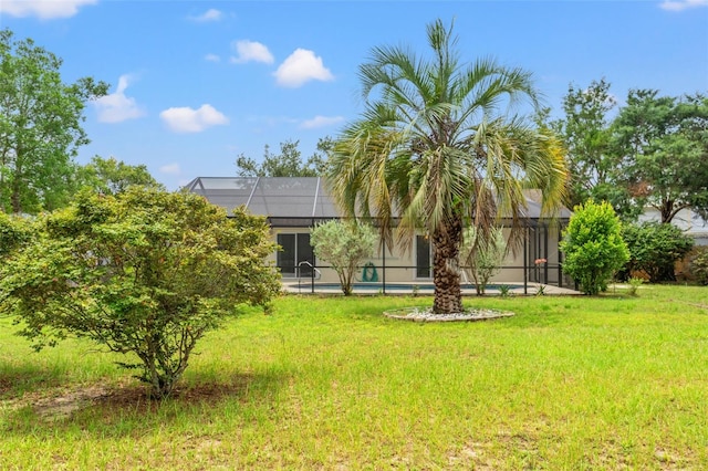 3956 N Tamarisk Pt, Beverly Hills, FL 34465 - view of green lawn featuring a lanai