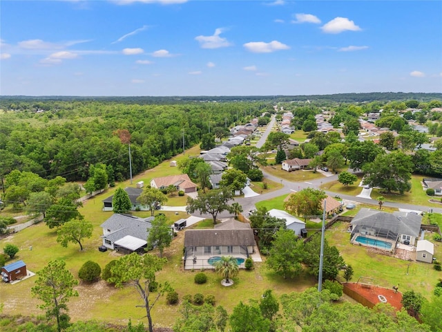 3956 N Tamarisk Pt, Beverly Hills, FL 34465 - aerial view of residential area with a heavily wooded area and a pool