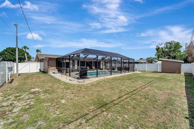 260 Venice E Blvd, Venice, FL 34293 - back of property with a patio area and a lanai