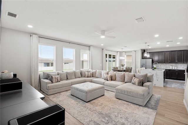 11719 Tetrafin Dr, Riverview, FL 33579 - living area featuring ceiling fan, recessed lighting, and light wood-style floors