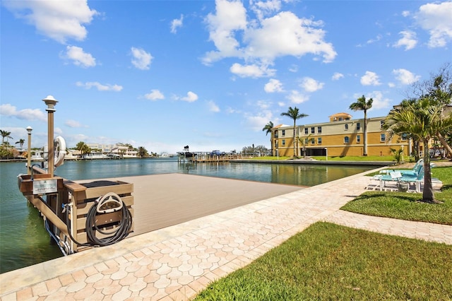 5445 Gulf Blvd Unit 210, St Pete Beach, FL 33706 - view of swimming pool with a water view and a dock