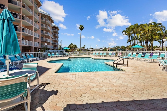 5445 Gulf Blvd Unit 210, St Pete Beach, FL 33706 - community pool featuring a patio area