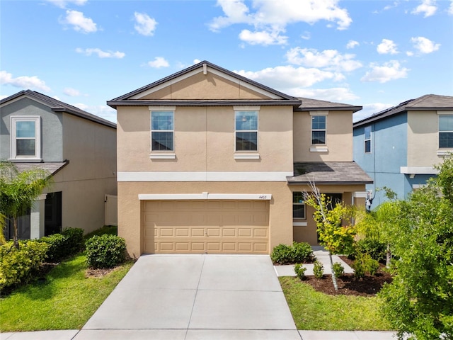 4403 Eternal Prince, Sun City Center, FL 33573 - view of front of property featuring stucco siding, driveway, and an attached garage