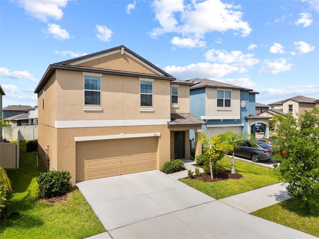 4403 Eternal Prince, Sun City Center, FL 33573 - view of front of home with stucco siding, a garage, concrete driveway, and a front lawn