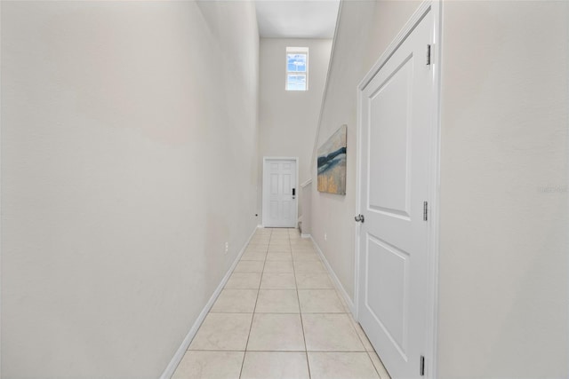 4403 Eternal Prince, Sun City Center, FL 33573 - corridor featuring light tile patterned floors and baseboards