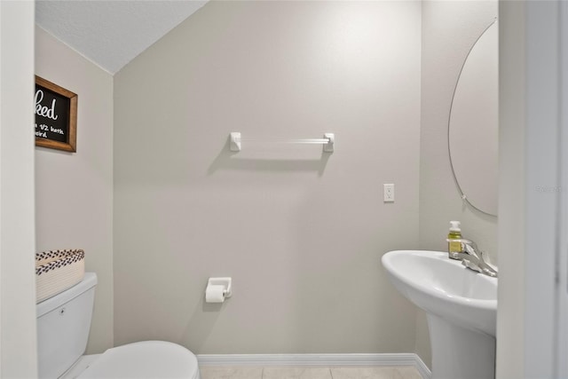 4403 Eternal Prince, Sun City Center, FL 33573 - half bathroom featuring toilet, vaulted ceiling, and baseboards