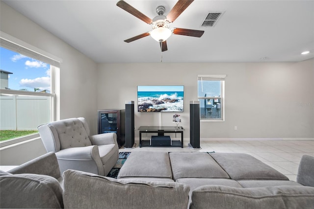 4403 Eternal Prince, Sun City Center, FL 33573 - tiled living room featuring ceiling fan and baseboards