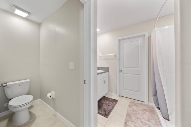 4403 Eternal Prince, Sun City Center, FL 33573 - full bathroom featuring toilet, tile patterned flooring, vanity, curtained shower, and baseboards