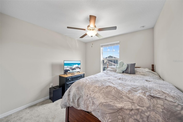 4403 Eternal Prince, Sun City Center, FL 33573 - bedroom with light colored carpet, baseboards, and ceiling fan