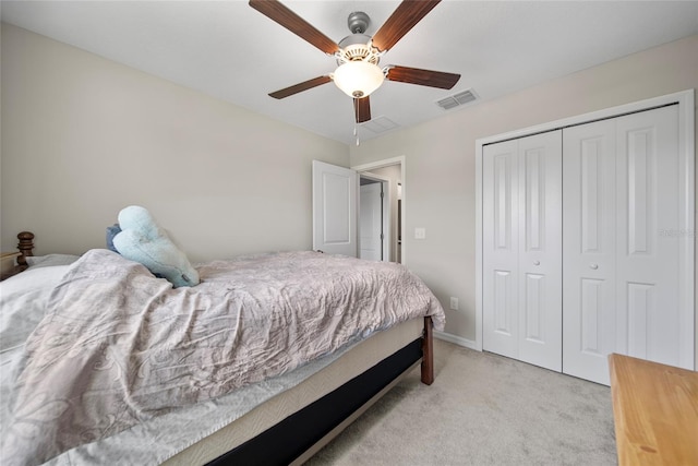 4403 Eternal Prince, Sun City Center, FL 33573 - bedroom with light carpet, a closet, ceiling fan, and baseboards