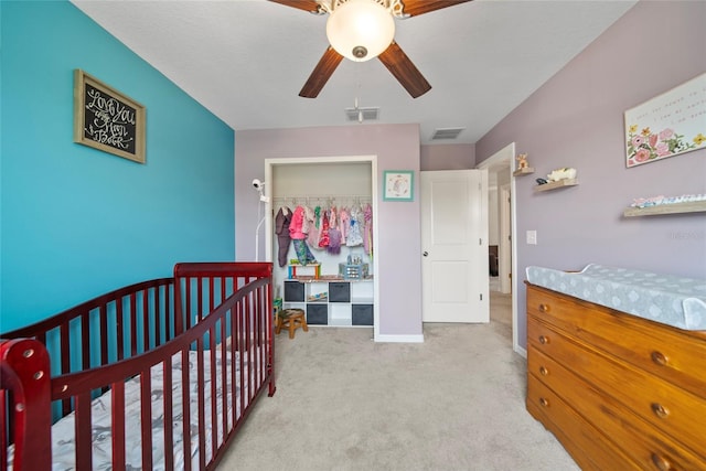 4403 Eternal Prince, Sun City Center, FL 33573 - carpeted bedroom with a closet, a ceiling fan, and baseboards