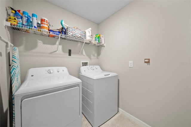 4403 Eternal Prince, Sun City Center, FL 33573 - laundry room with washer and dryer and baseboards