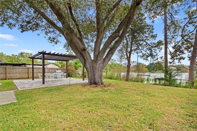 12529 Mondragon Dr, Tampa, FL 33625 - view of yard featuring a pergola and a patio
