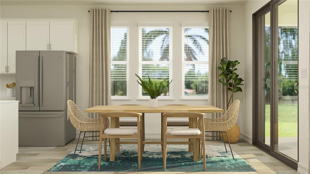 7546 E 117th Ln, Palmetto, FL 34221 - dining area with light wood finished floors