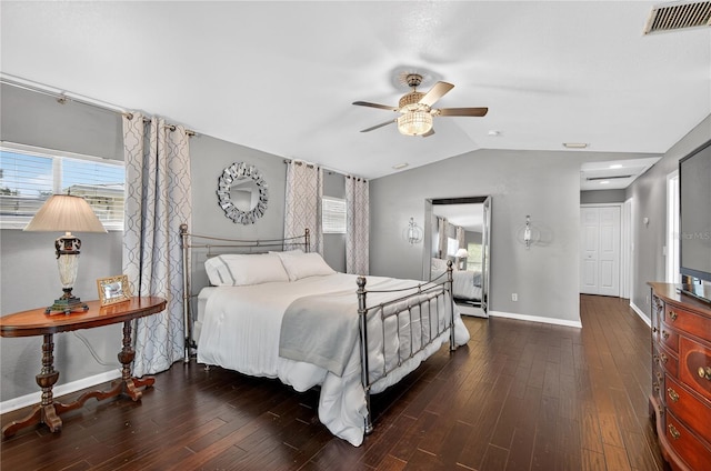 511 Island Way, Clearwater Beach, FL 33767 - bedroom with wood finished floors, lofted ceiling, and a ceiling fan