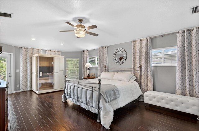 511 Island Way, Clearwater Beach, FL 33767 - bedroom featuring multiple windows, wood finished floors, recessed lighting, and ceiling fan