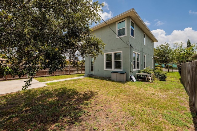 4301 5th Ave N, Saint Petersburg, FL 33713 - back of house featuring stucco siding and a patio